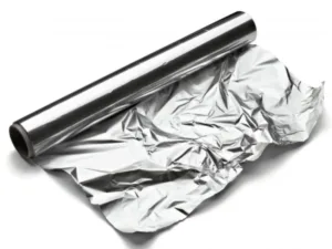 Wrapped potatoes in aluminum foil for grilling