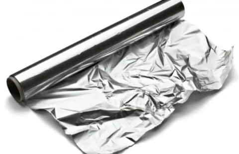 Wrapped potatoes in aluminum foil for grilling